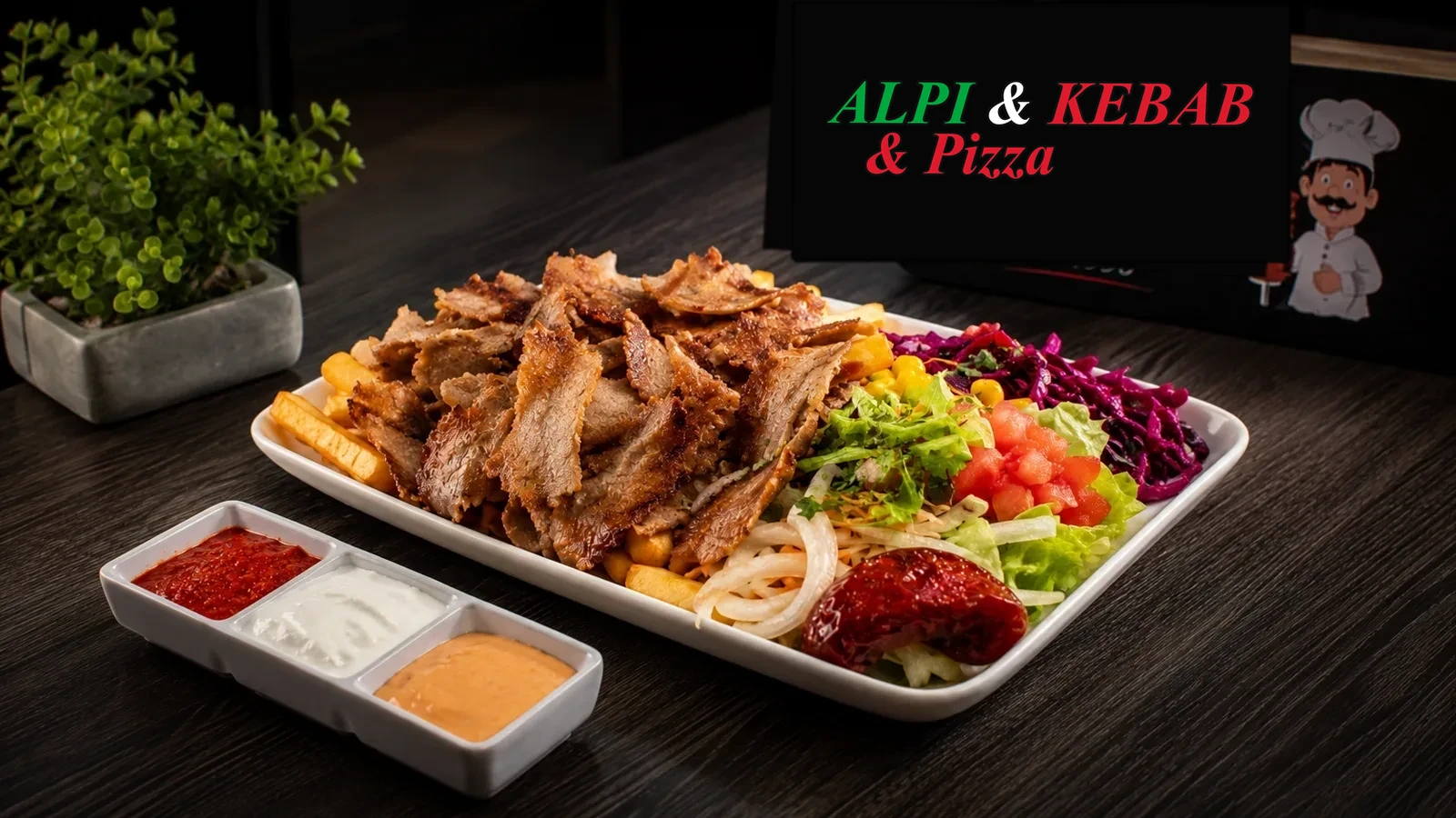Döner-Teller mit Jungbullen-Fleisch, Pommes, Salat und hausgemachten Soßen